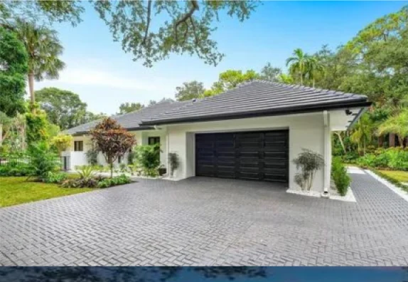Finished South Florida home with a clean tile roof installed by DR Construction & Roofing