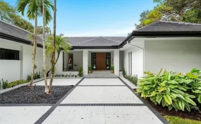 South Florida luxury home with a finished tile roof by DR Construction & Roofing
