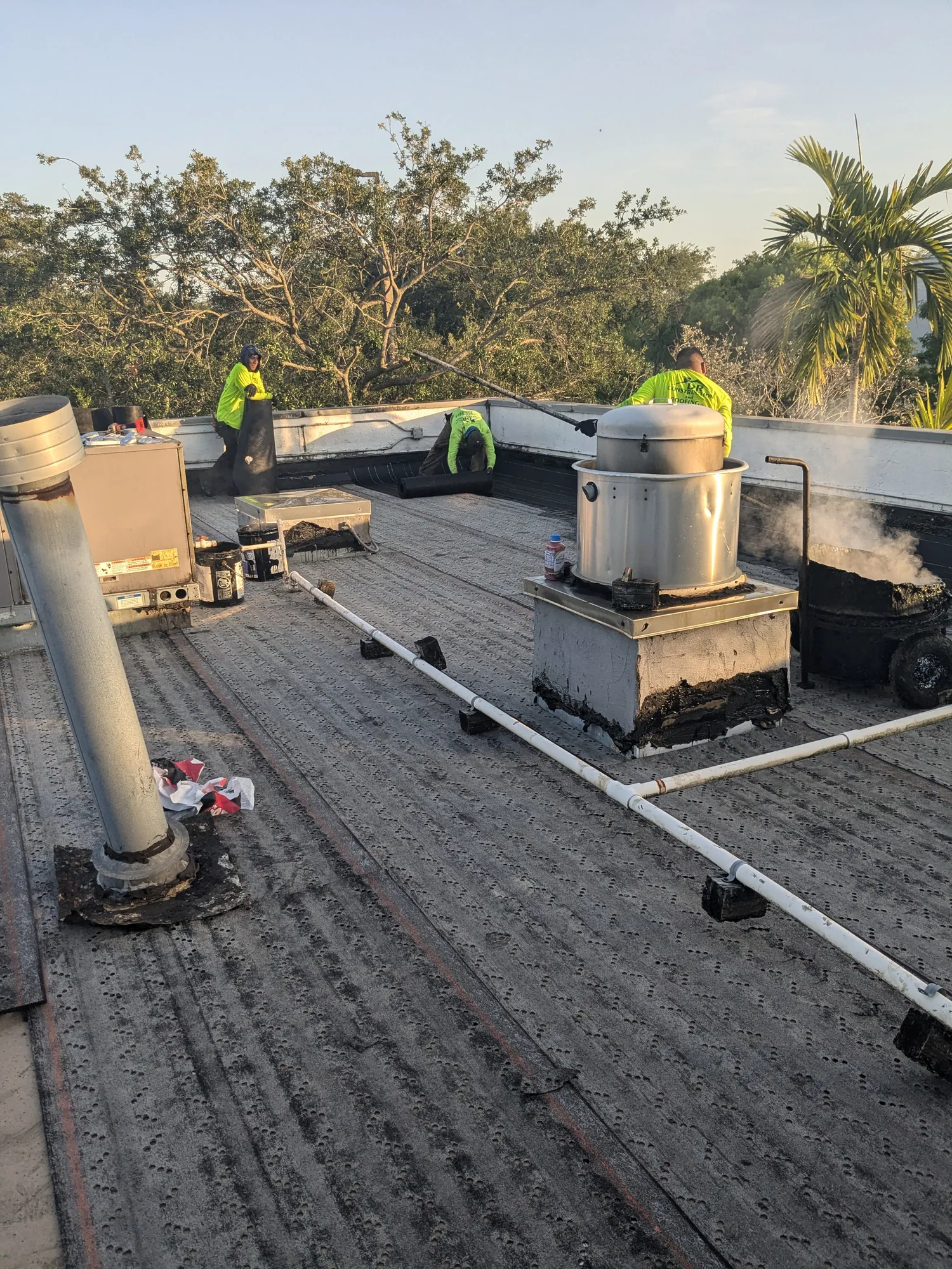 Commercial flat roof hot-mop installation by DR Construction & Roofing in South Florida