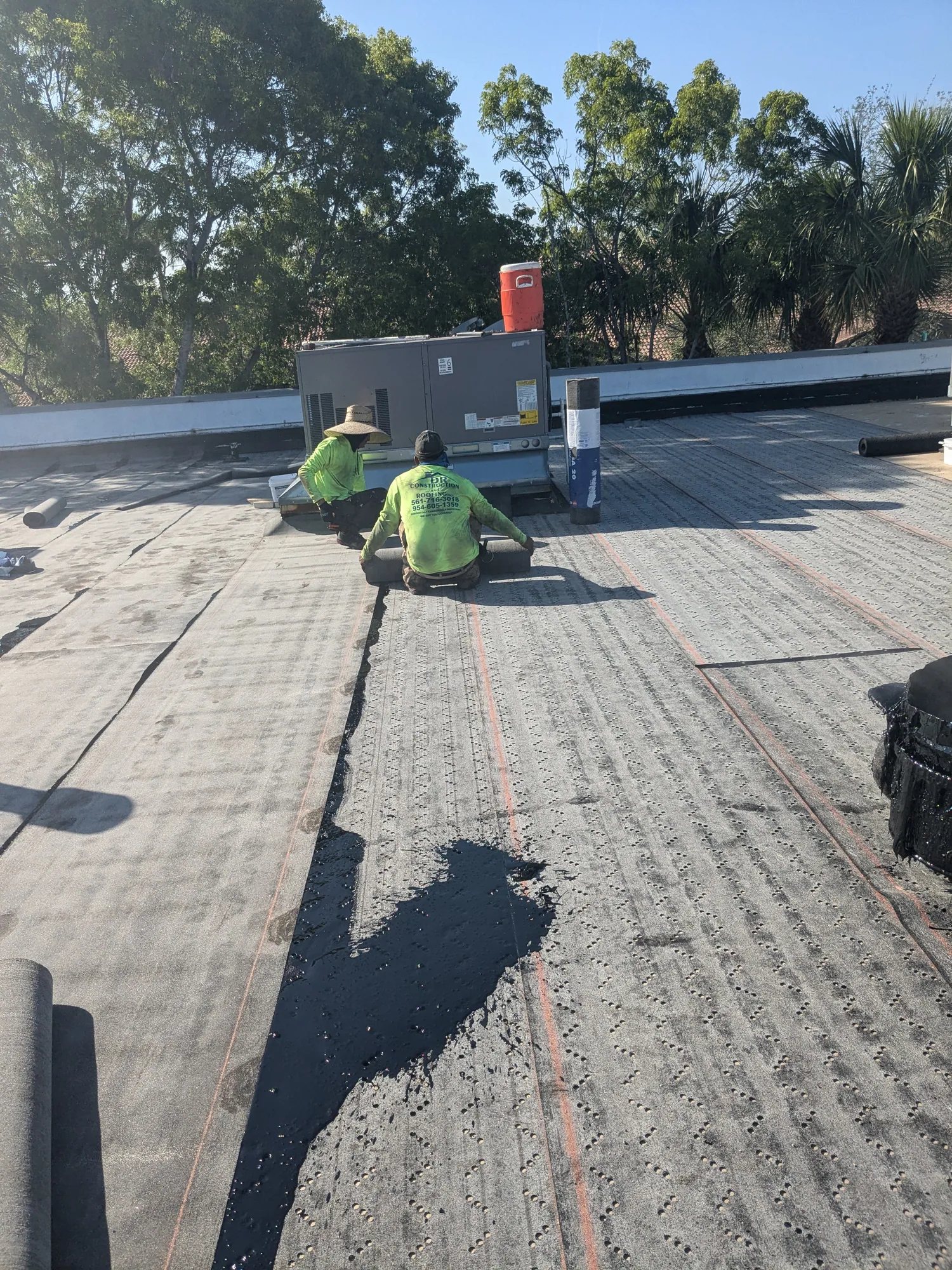 Commercial flat roof hot-mop installation by DR Construction & Roofing in South Florida