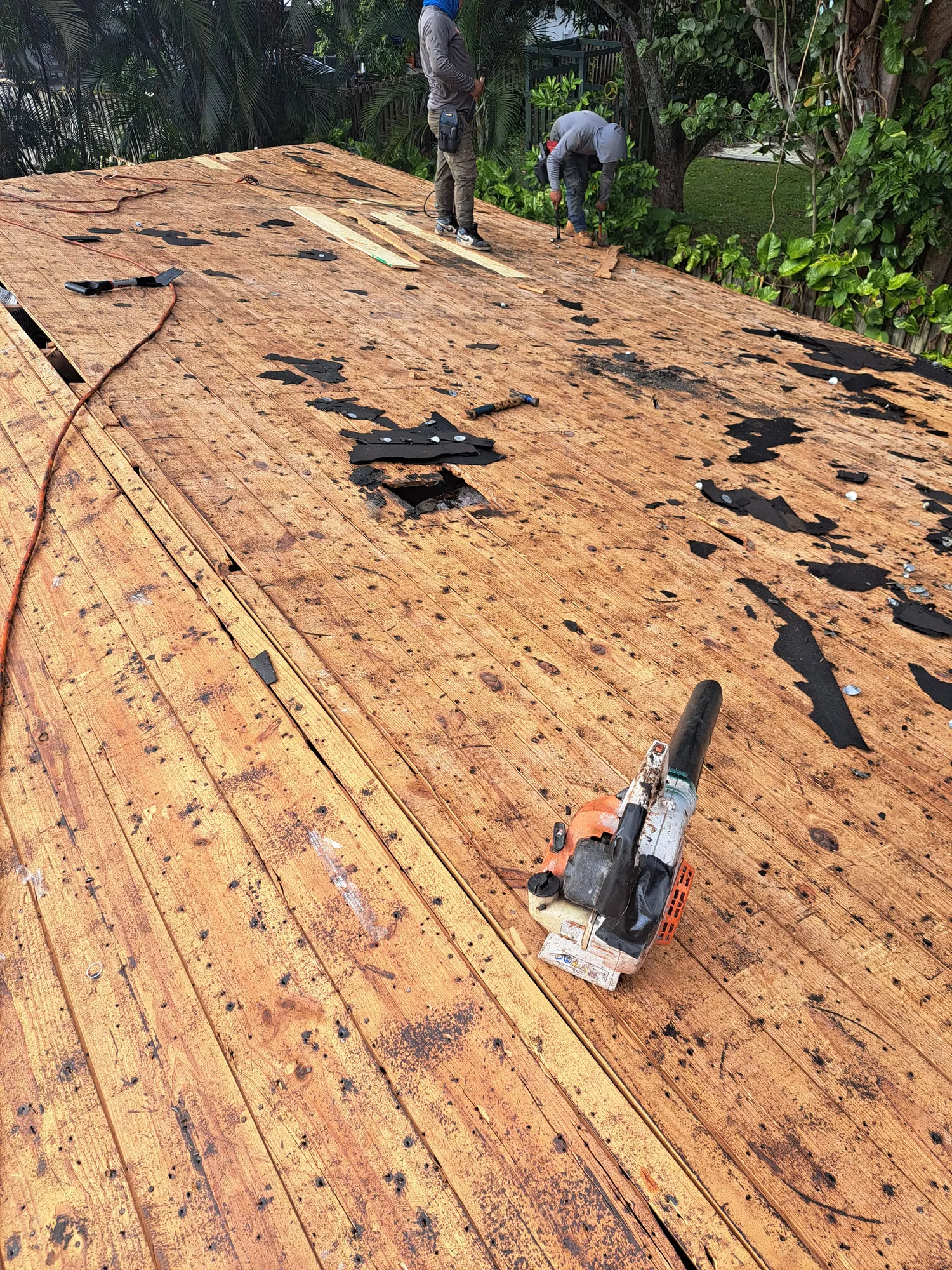 Grey architectural shingle re-roof by DR Construction & Roofing in South Florida