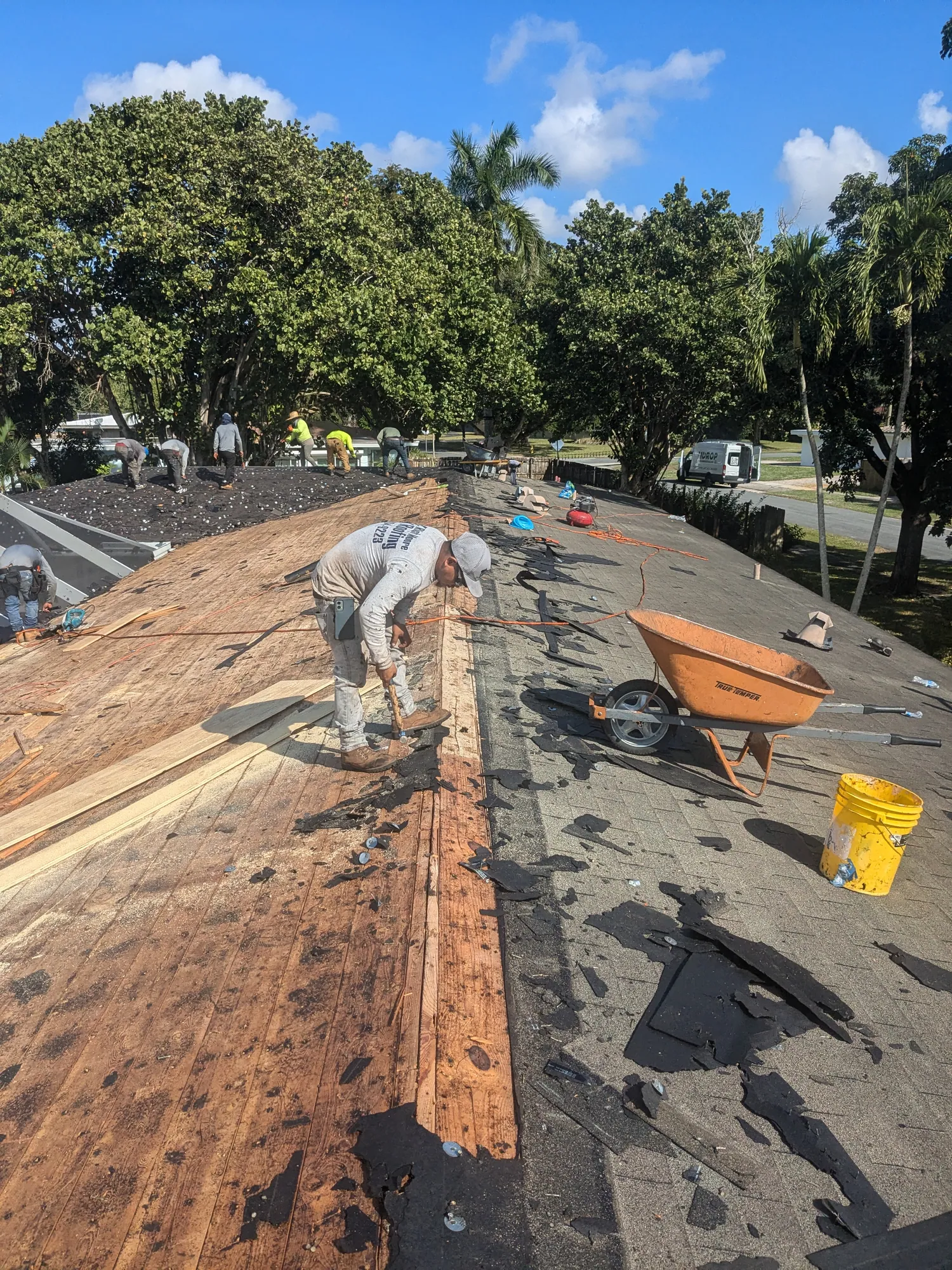 Grey architectural shingle re-roof by DR Construction & Roofing in South Florida