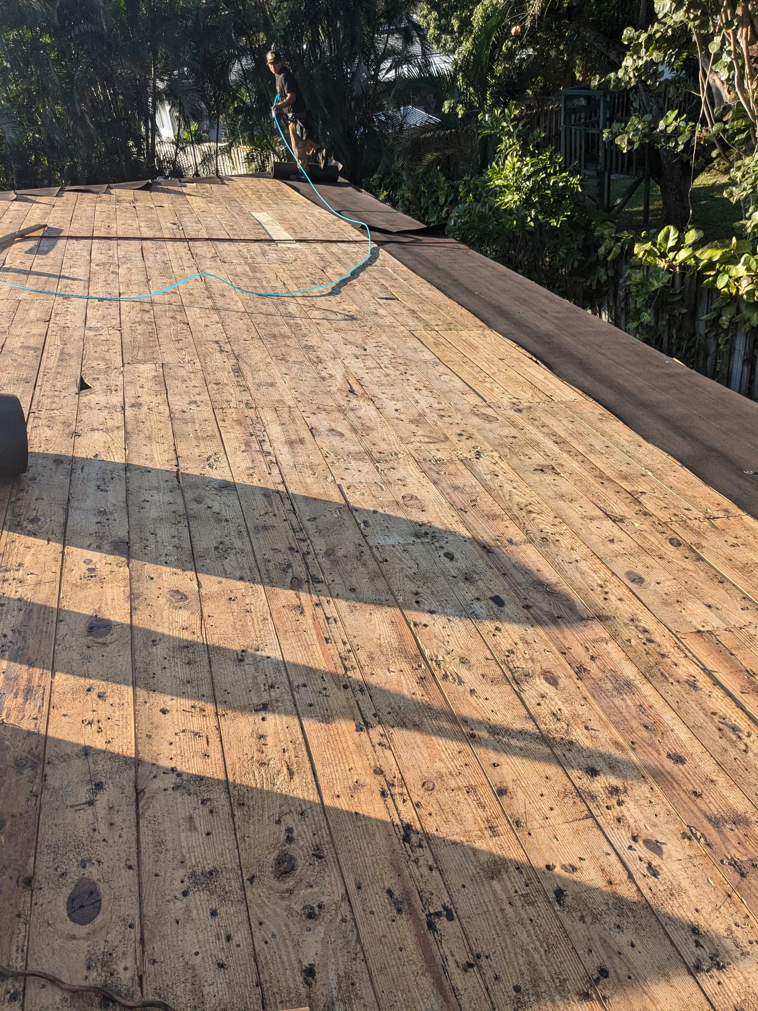 Grey architectural shingle re-roof by DR Construction & Roofing in South Florida