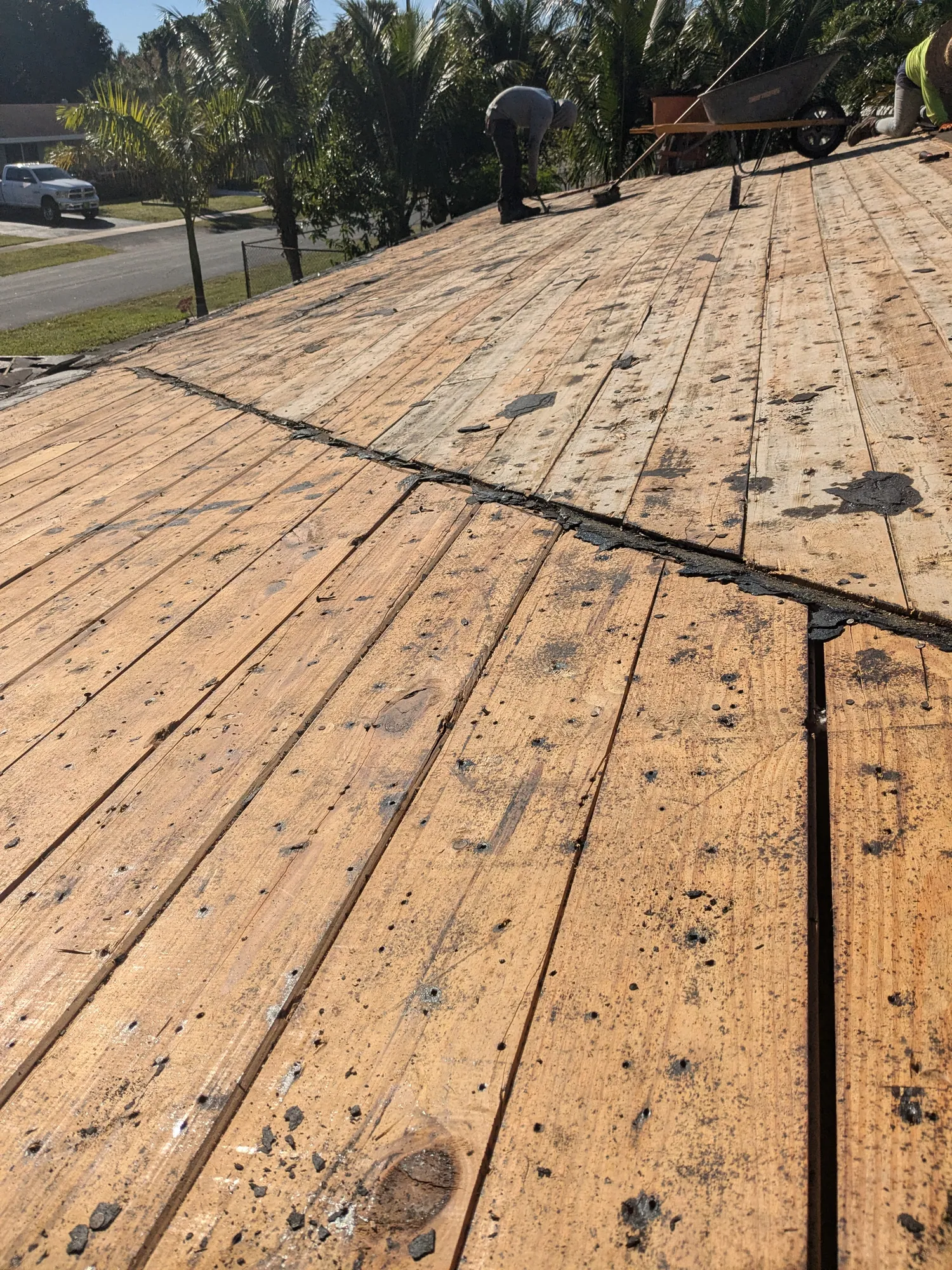 Grey architectural shingle re-roof by DR Construction & Roofing in South Florida