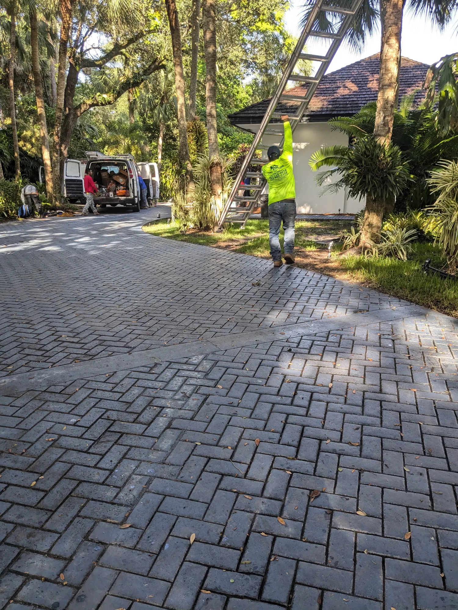 Charcoal flat tile roof installation by DR Construction & Roofing in South Florida