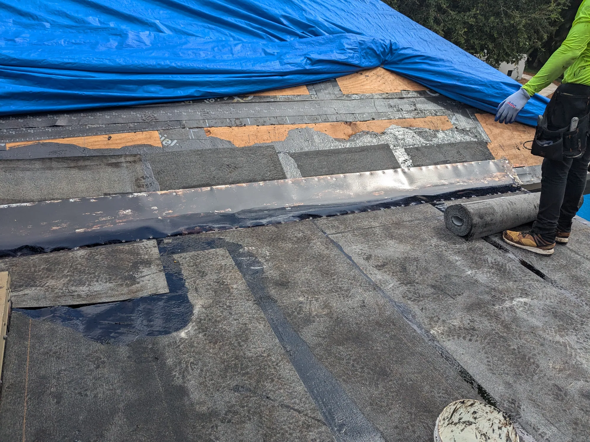 Charcoal flat tile roof installation by DR Construction & Roofing in South Florida