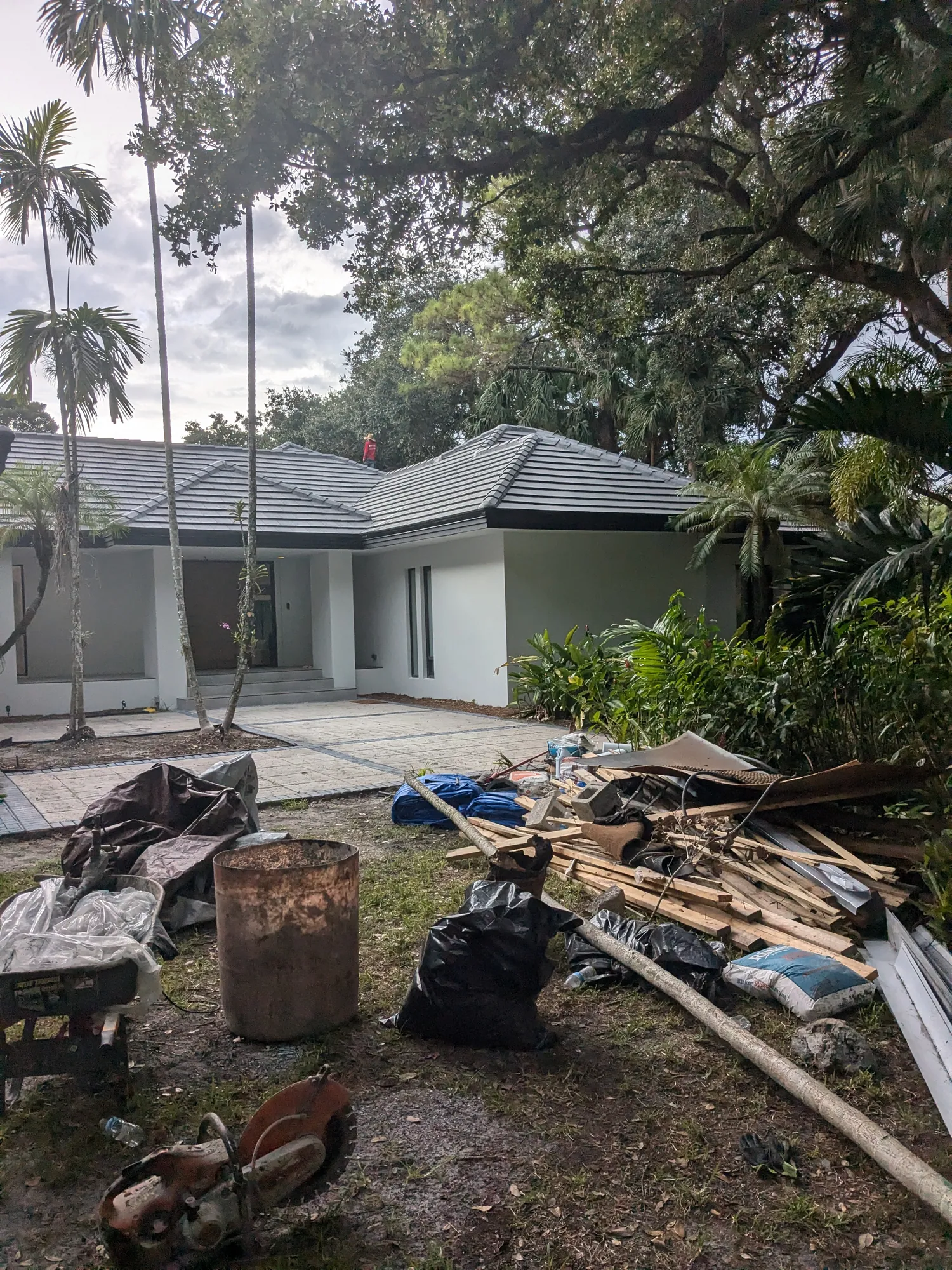 Charcoal flat tile roof installation by DR Construction & Roofing in South Florida