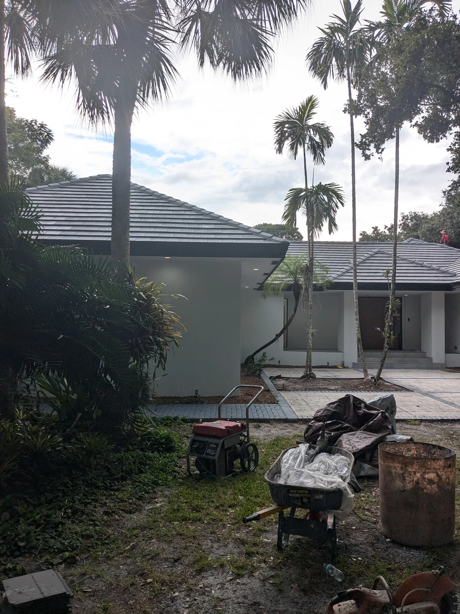 Charcoal flat tile roof installation by DR Construction & Roofing in South Florida