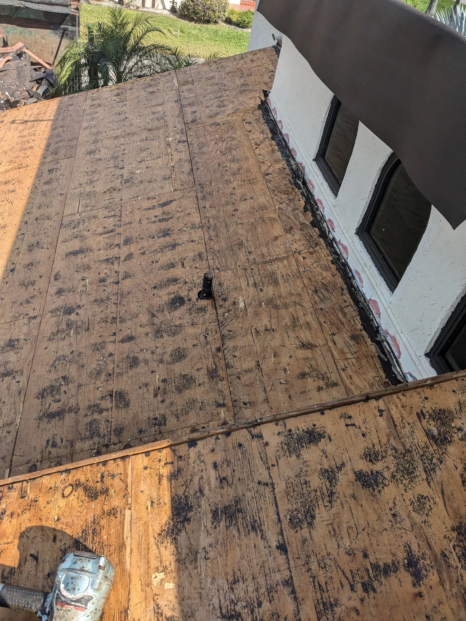 Terracotta barrel tile roof installation by DR Construction & Roofing in South Florida