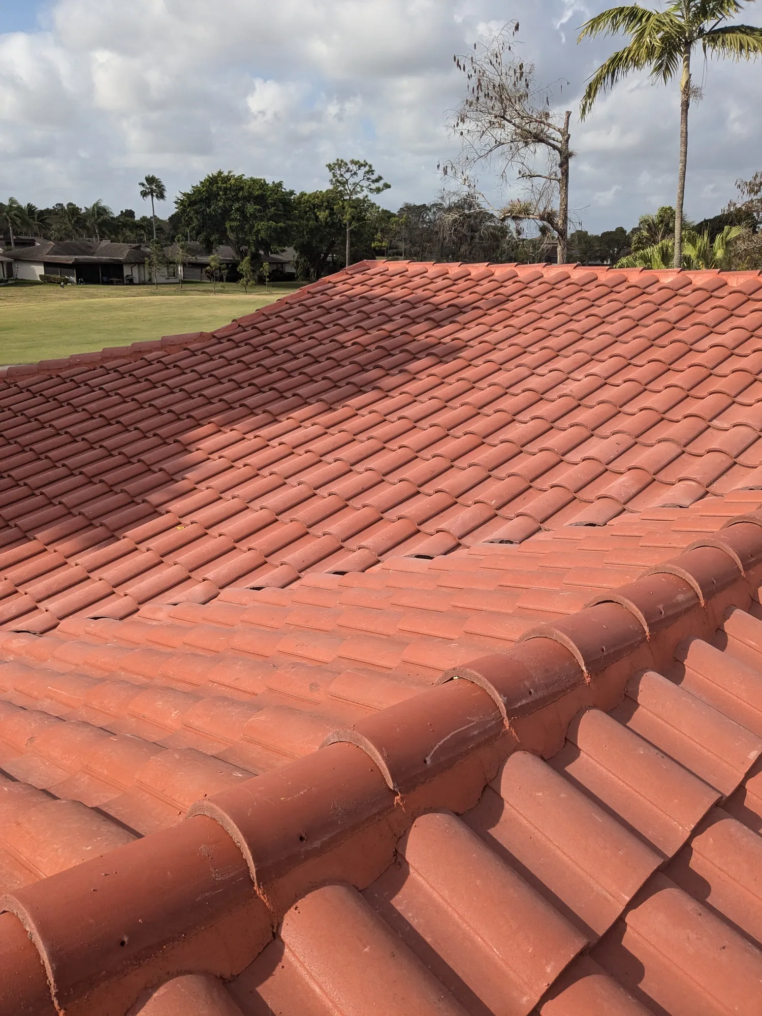 Terracotta barrel tile roof installation by DR Construction & Roofing in South Florida
