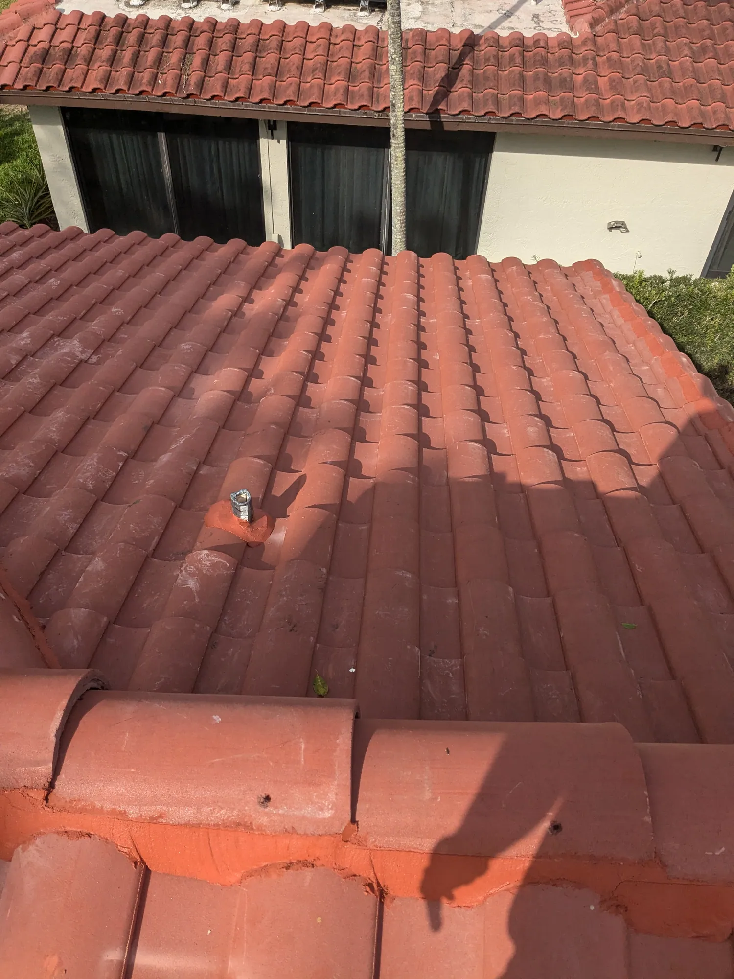 Terracotta barrel tile roof installation by DR Construction & Roofing in South Florida