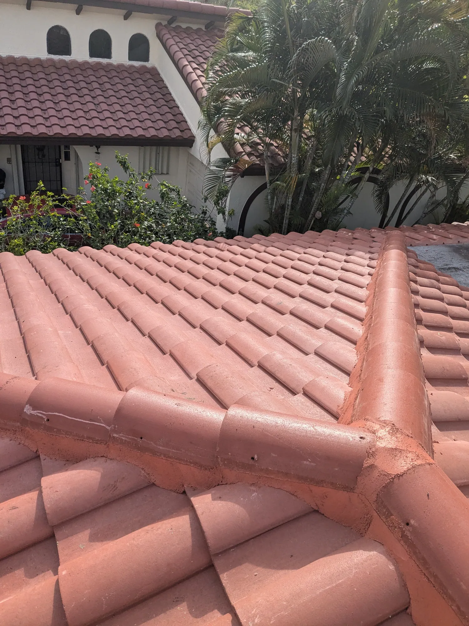 Terracotta barrel tile roof installation by DR Construction & Roofing in South Florida