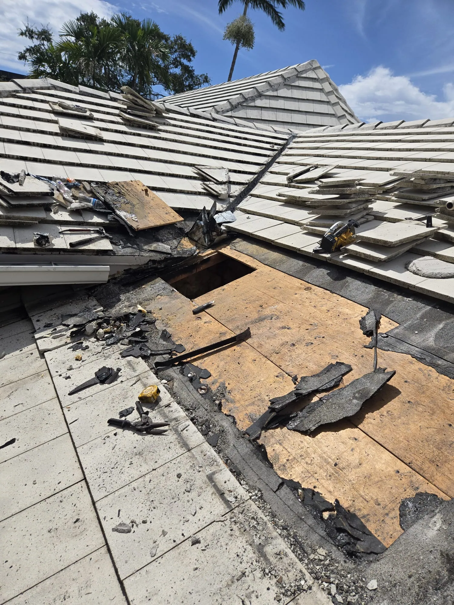 Residential tile roof repair by DR Construction & Roofing in South Florida