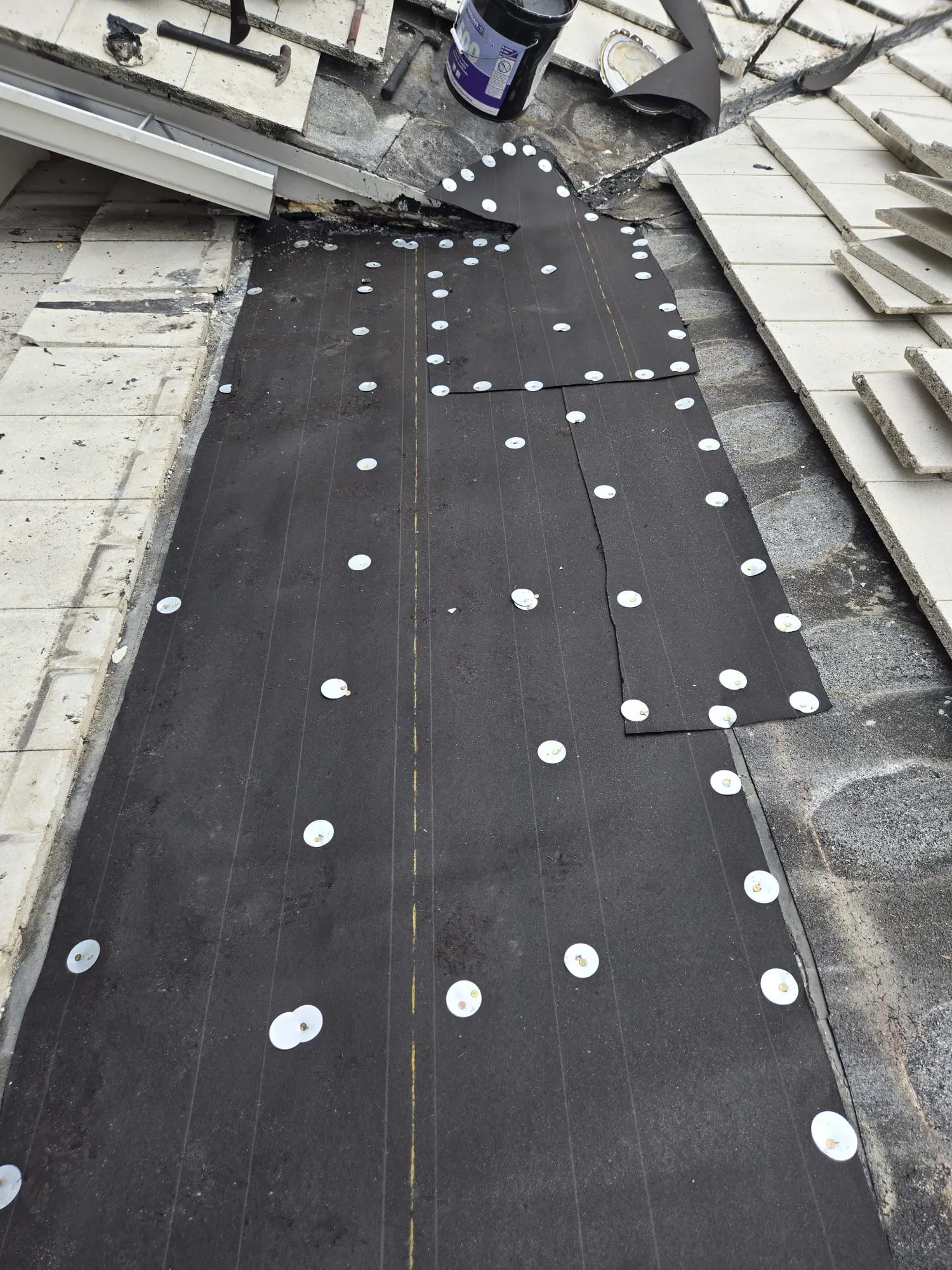Residential tile roof repair by DR Construction & Roofing in South Florida