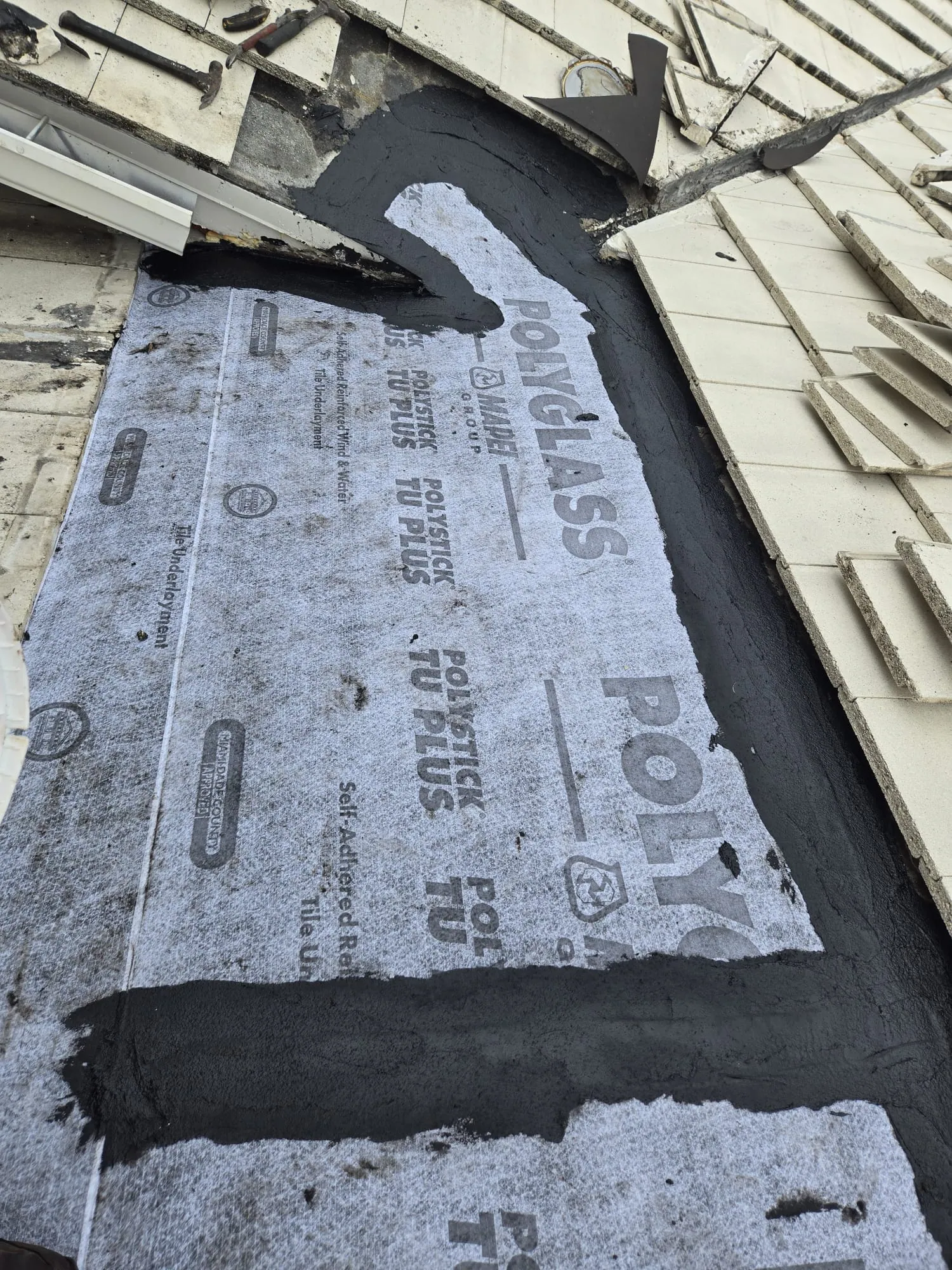 Residential tile roof repair by DR Construction & Roofing in South Florida