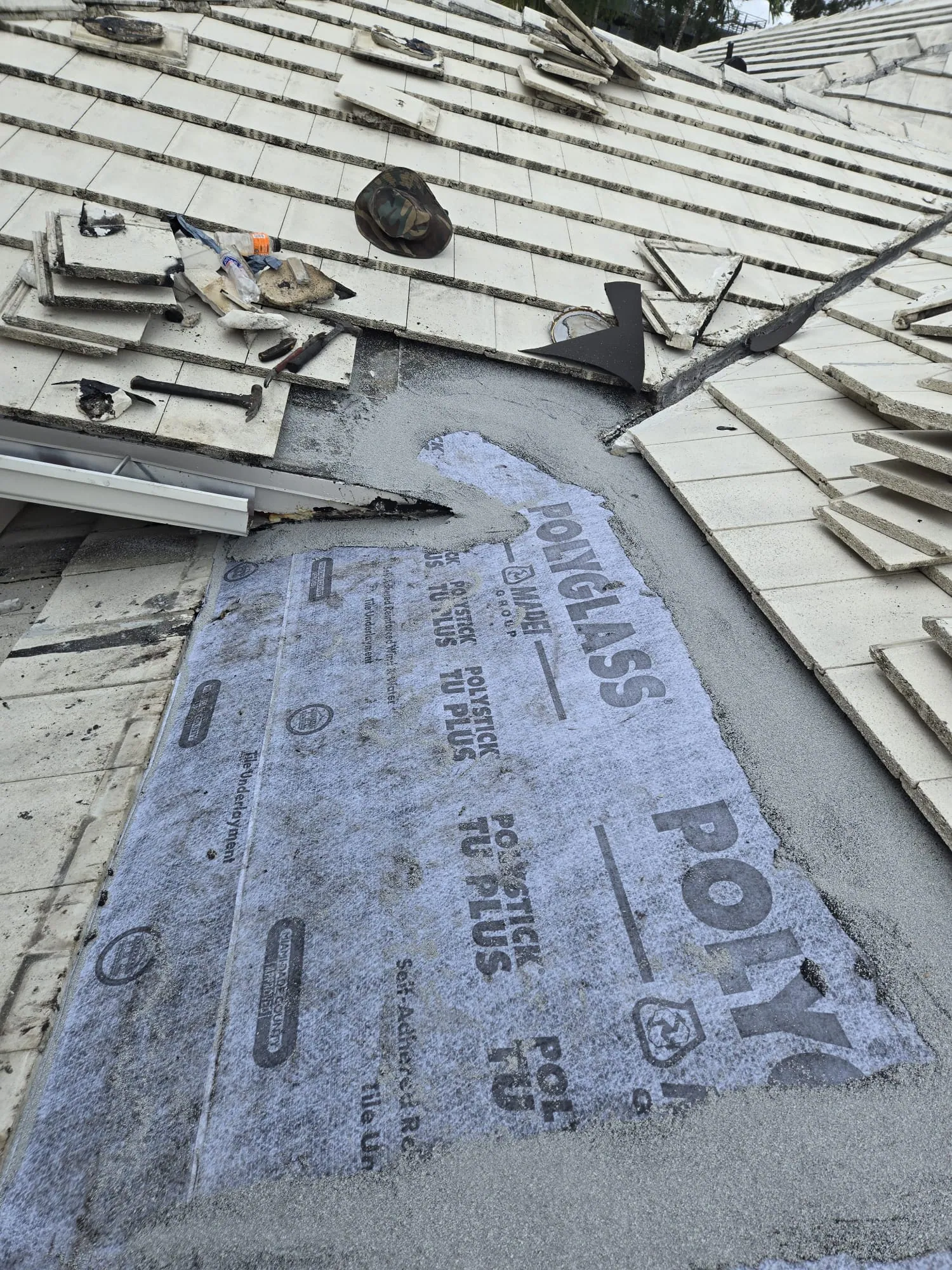 Residential tile roof repair by DR Construction & Roofing in South Florida