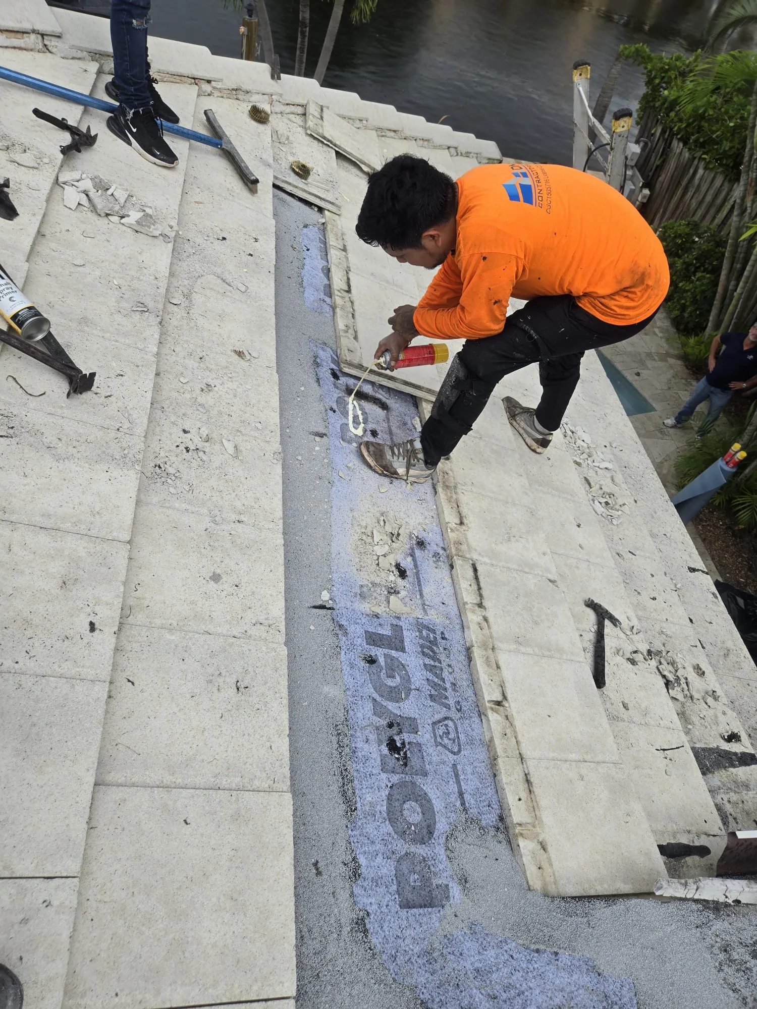 Residential tile roof repair by DR Construction & Roofing in South Florida